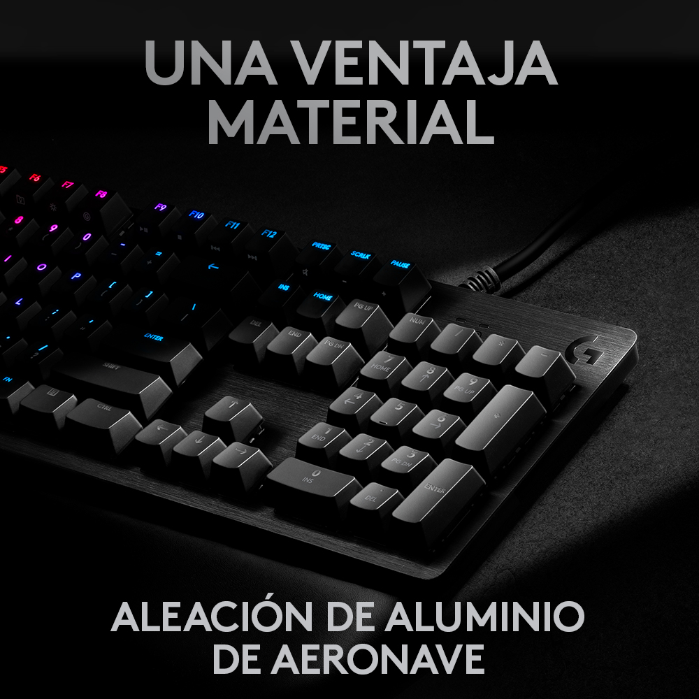 Teclado negro con teclas blancas. Las palabras 'Una Ventaja Material' están en la parte superior.