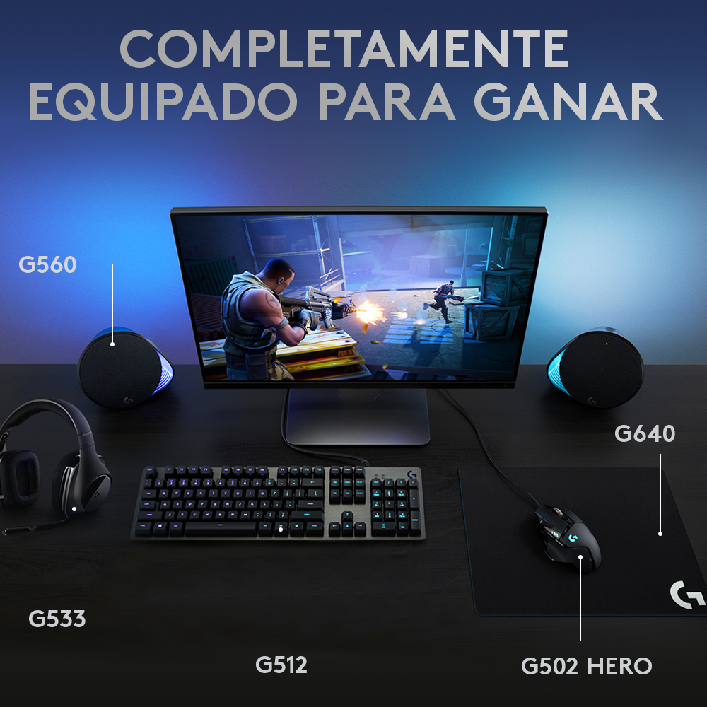 Configuración de juego: monitor, altavoces, teclado, ratón y auriculares. El texto dice 'Completamente equipado para ganar'.
