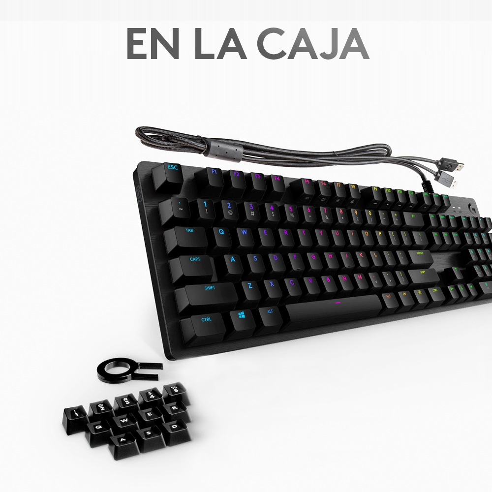 Teclado gaming negro con teclas sueltas y cable trenzado. Teclas coloridas y texto EN LA CAJA.