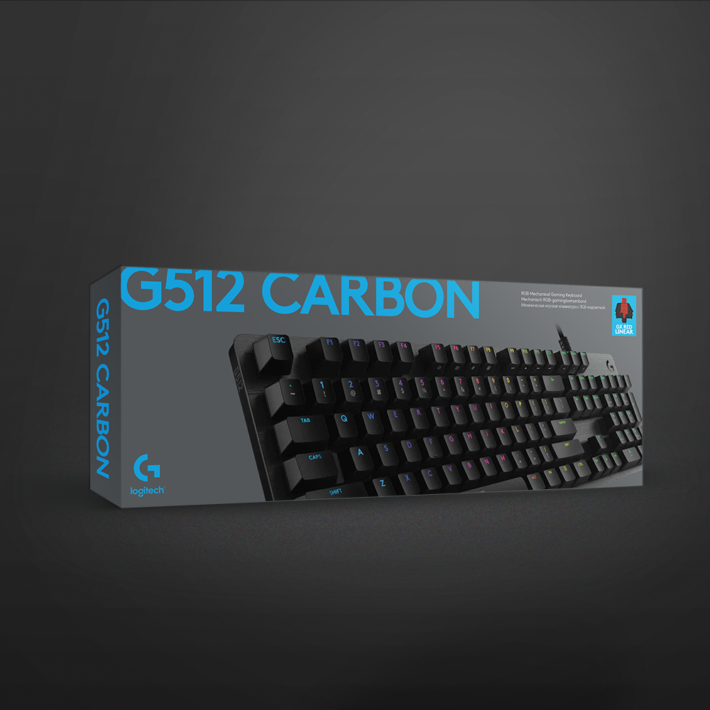 Una caja de teclado con el texto 'G512 CARBON' y el logotipo de Logitech.