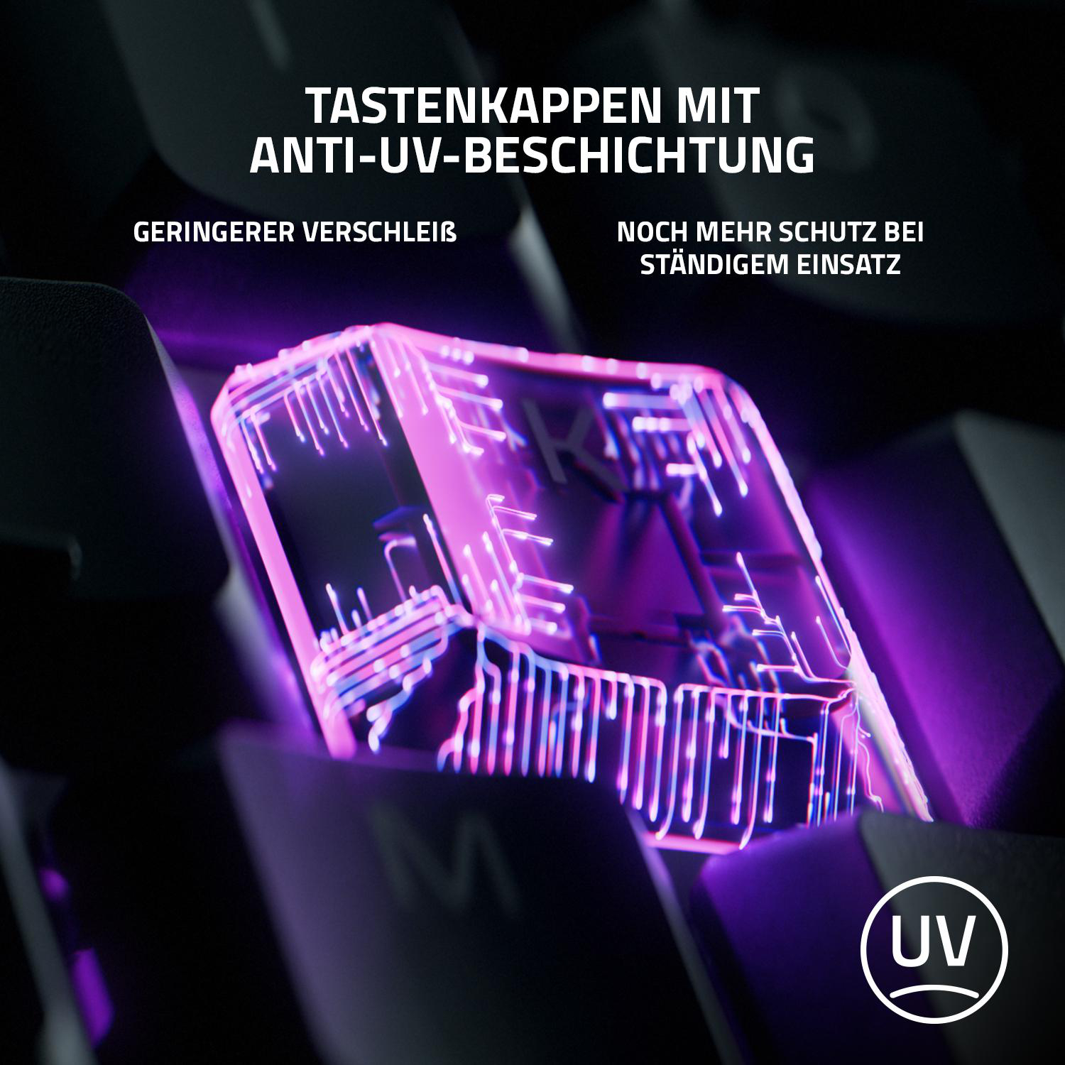 Nahaufnahme einer Tastaturtaste. Die Taste wird mit UV-Licht beleuchtet.