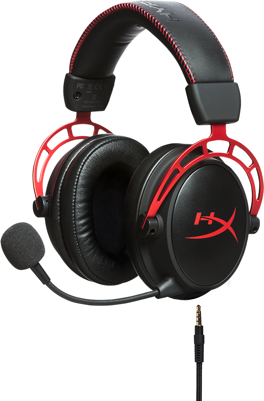 Black and red gaming headset with a microphone. White background.  Headset is on a black surface.