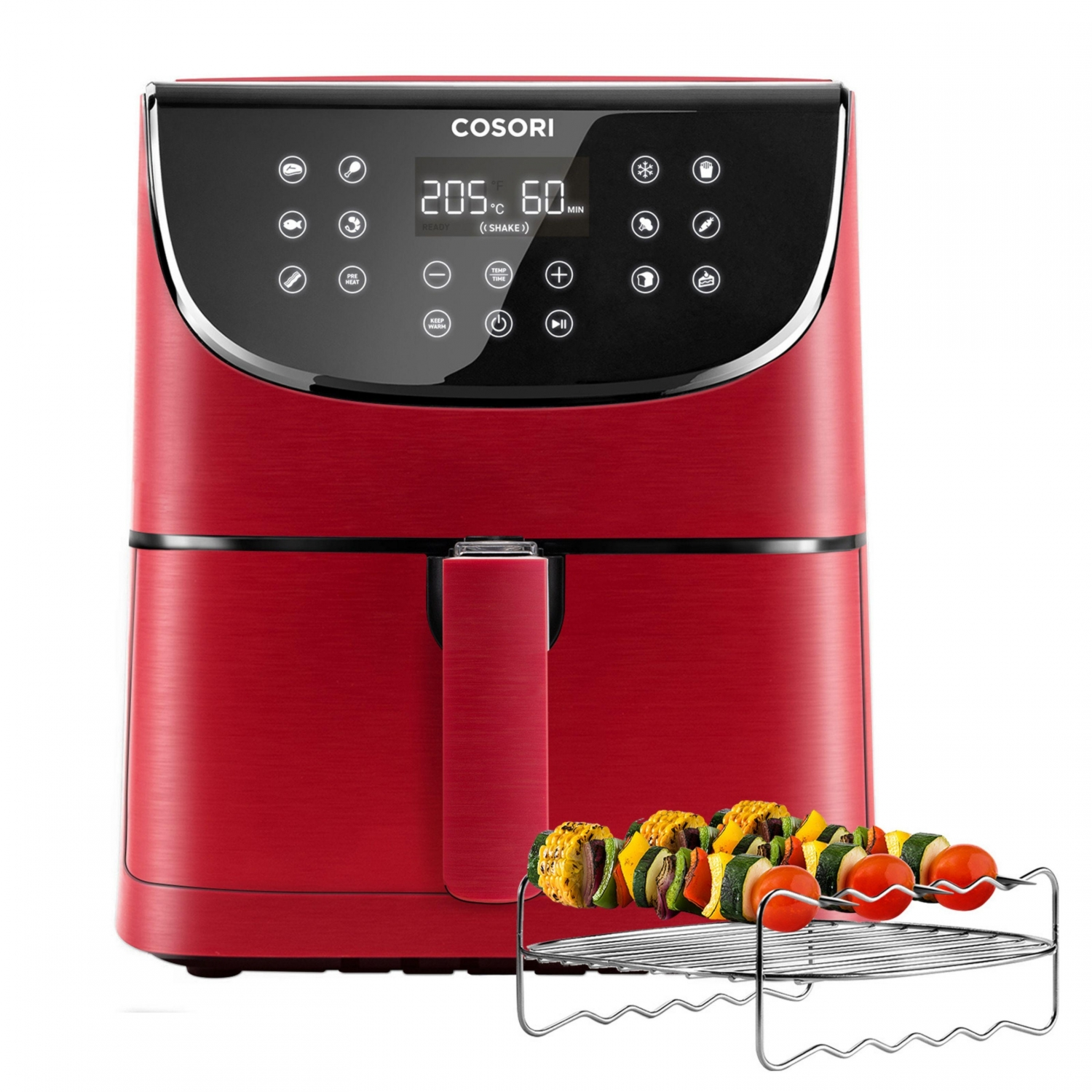 Freidora de aire roja con pantalla digital. Verduras ensartadas en una rejilla metálica delante.