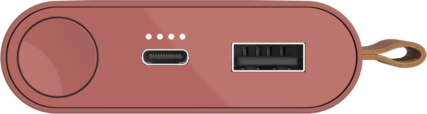 Gros plan d'une batterie externe rose avec un port USB-C, un port USB et une sangle en cuir.