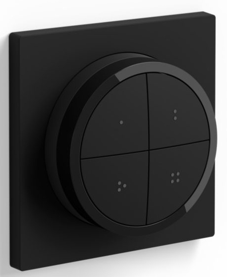 Black, square light switch with a circular control. Four dots on each quadrant.