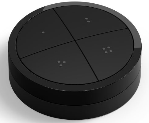 Black, round smart home button with four segmented buttons.