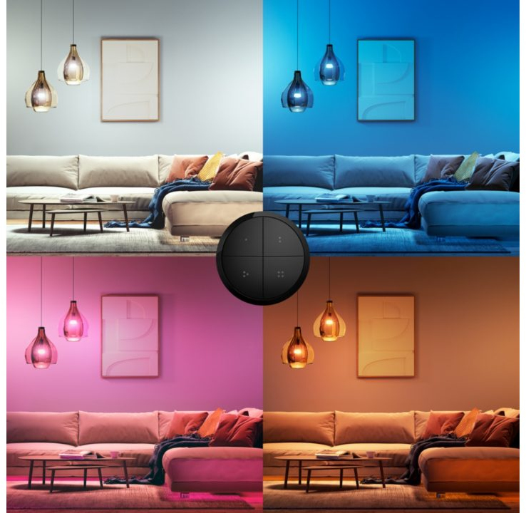 Image of a room with smart lighting. Four quadrants with different color schemes controlled by a remote.