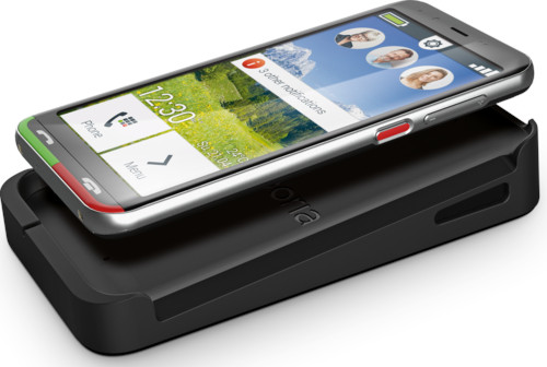 Smartphone sur un socle de charge avec une interface d'appel téléphonique.