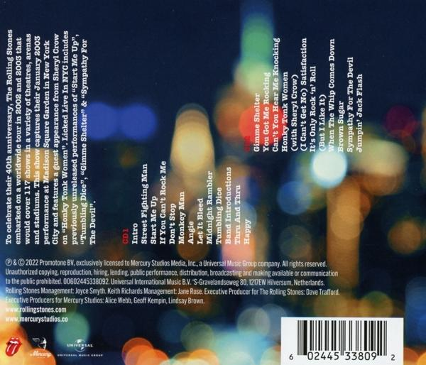 CD-Cover mit Text über die Tournee der Rolling Stones und verschwommenem Stadtpanorama.