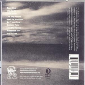 CD-Cover mit einer Strandszene und Text.