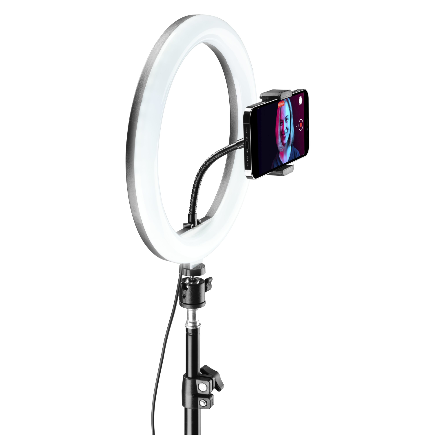 A ring light with a smartphone attached. A woman appears on the phone's screen. White background.