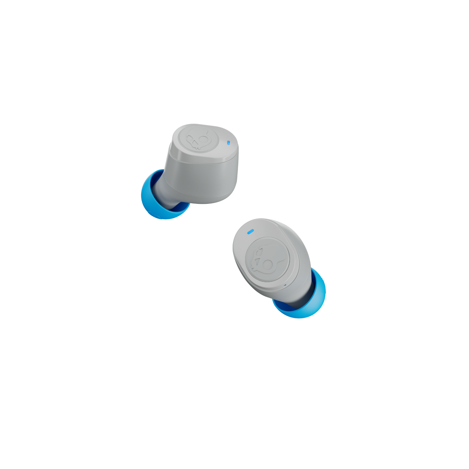 Two gray Skullcandy earbuds with blue ear tips, floating against a black background.