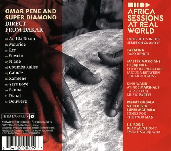 Albumcover von "Africa Sessions at Real World". Hände halten das Album mit Titelliste.