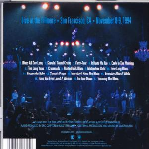Pochette de CD avec titres de musique live et fond de scène de concert.
