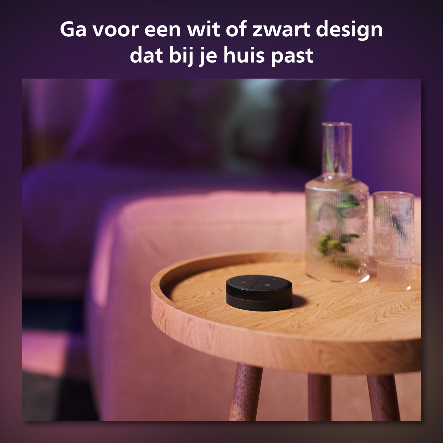 A black smart home button on a wooden table with a glass and a decorative bottle.