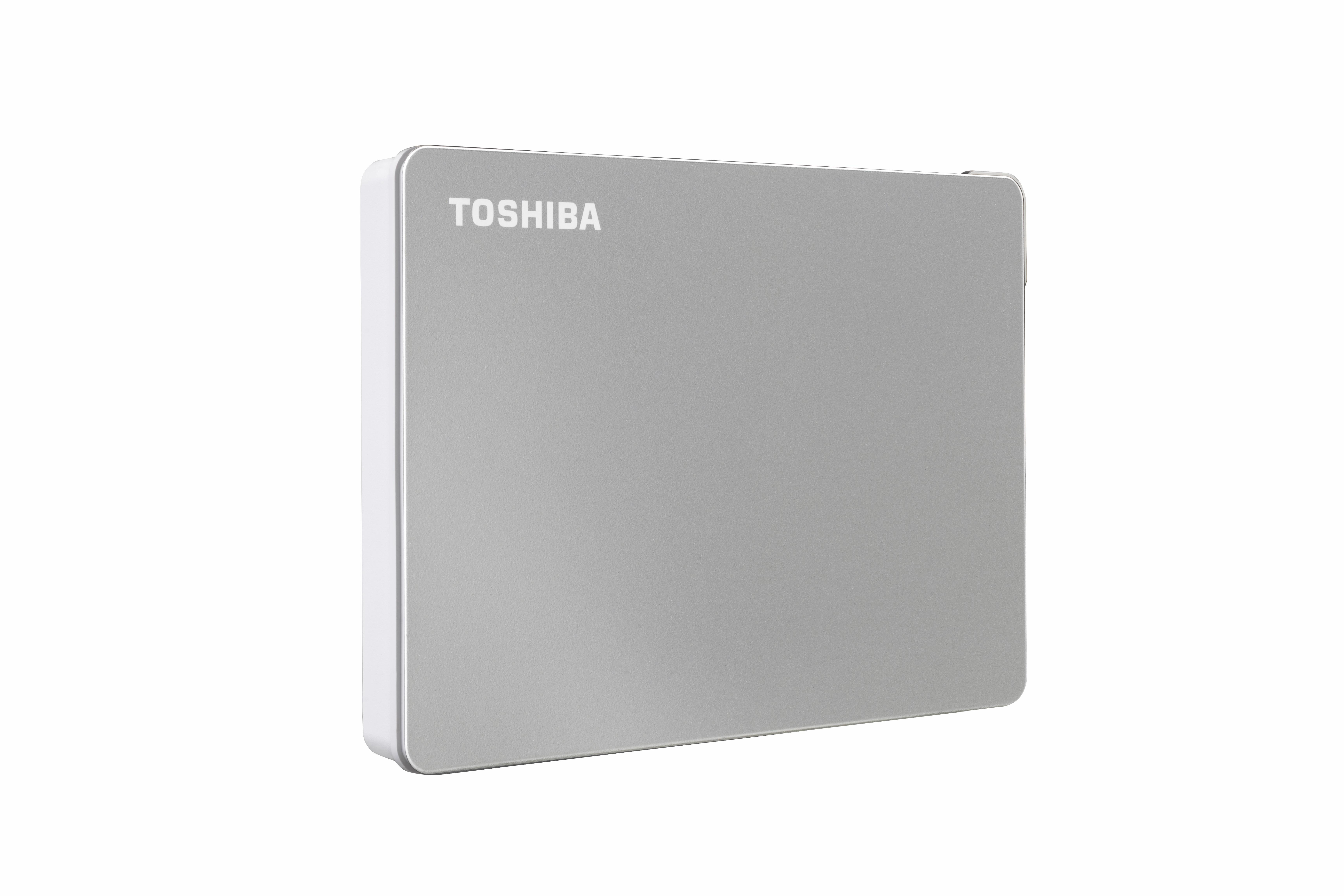 Eine silberne externe Festplatte von Toshiba, mit dem Toshiba-Logo in Weiß oben.