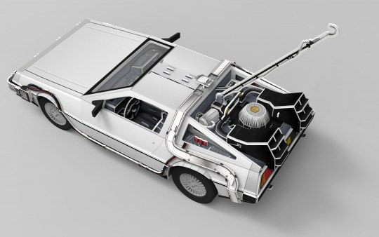 Weißes DeLorean-Automodell mit offenem Motor, detailliert, auf grauer Oberfläche.
