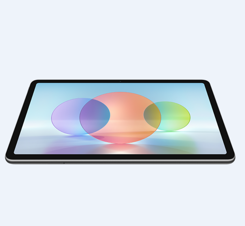 Ekranında renkli şekiller bulunan beyaz bir yüzeyde tablet.