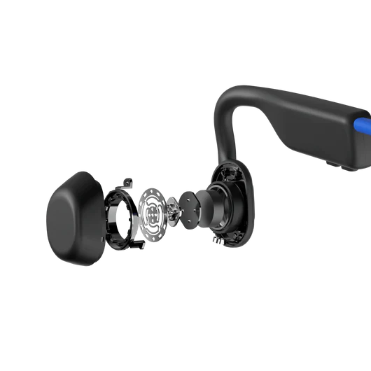 Vue éclatée d'un casque noir montrant les composants internes sur fond noir.