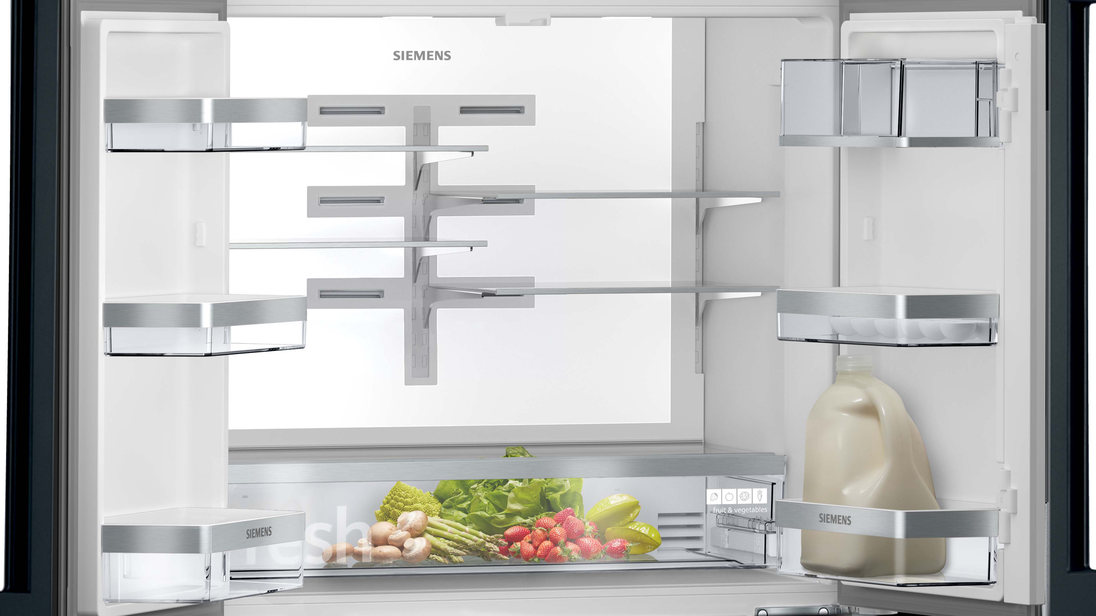 An empty, gray, angled container for utensils, with a cutout design, on a white surface.