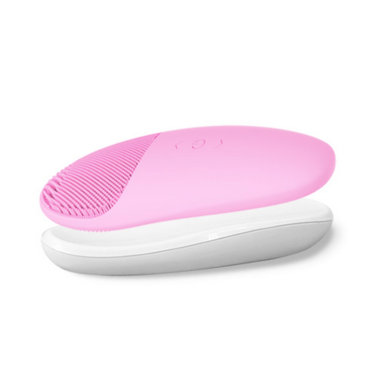 Dispositivo rosa de limpieza facial sobre una base blanca. El dispositivo tiene superficie texturizada.