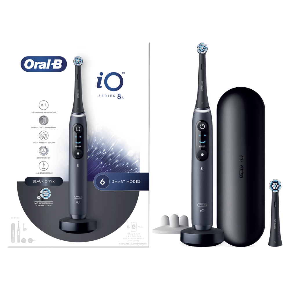 Dos cepillos de dientes eléctricos Oral-B iO Series 8s, uno en base de carga, con accesorios.