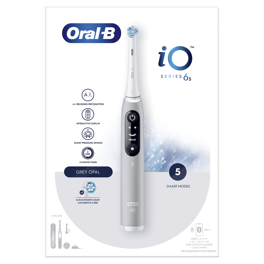 Cepillo de dientes eléctrico blanco y gris con características y modos inteligentes.