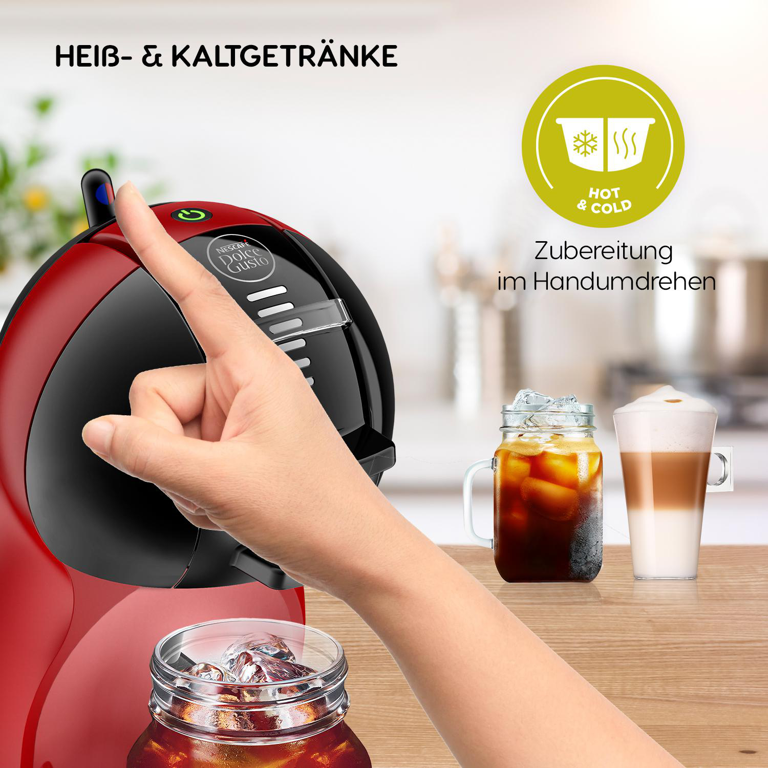 Eine Hand zeigt auf eine rot-schwarze Kaffeemaschine mit Getränken.