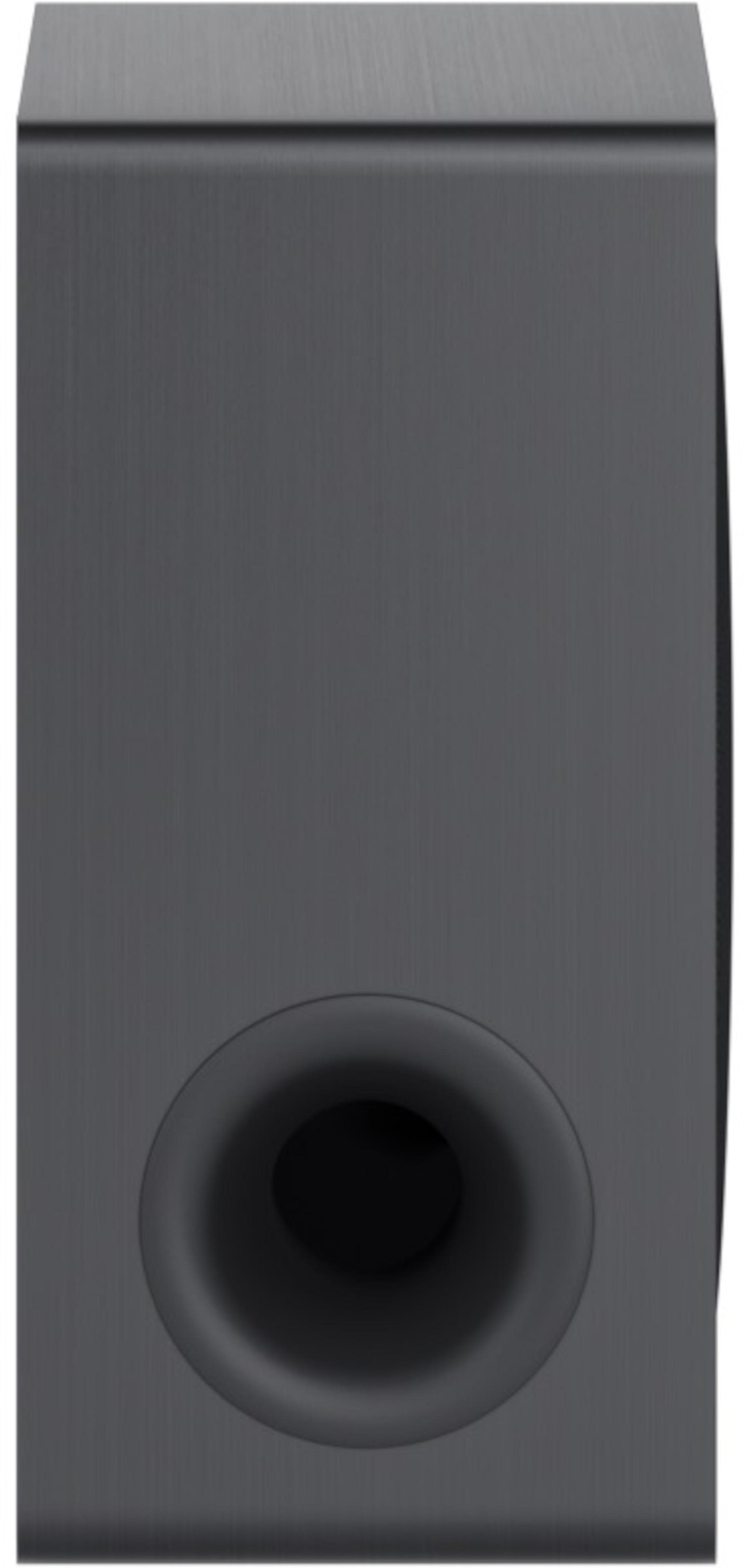 Schwarzer Subwoofer, Vorderansicht. Kreisförmiger Anschluss, glatte Oberfläche. Vertikale Ausrichtung.