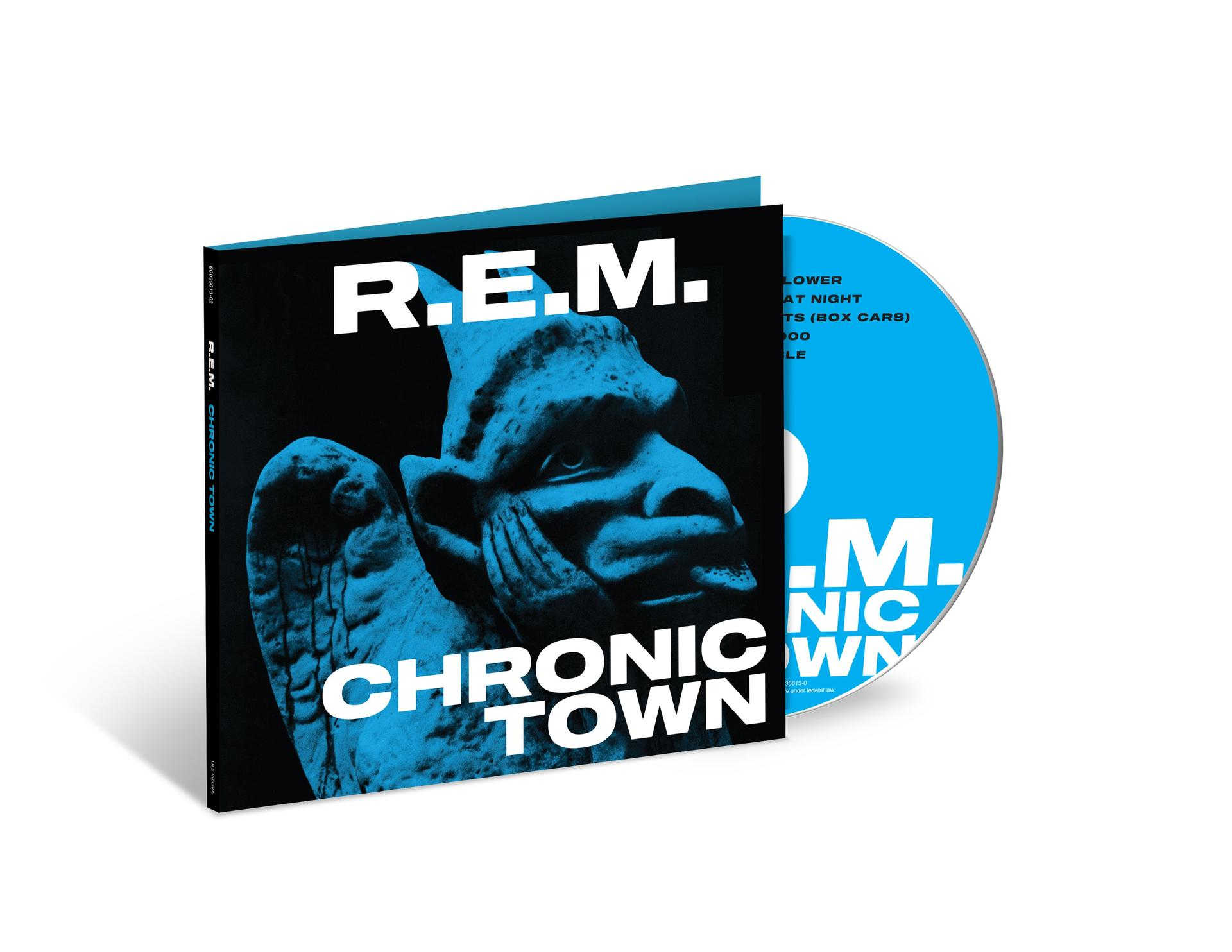 R.E.M. Chronic Town Albumcover, mit einem blauen Wasserspeier auf schwarzem Hintergrund.