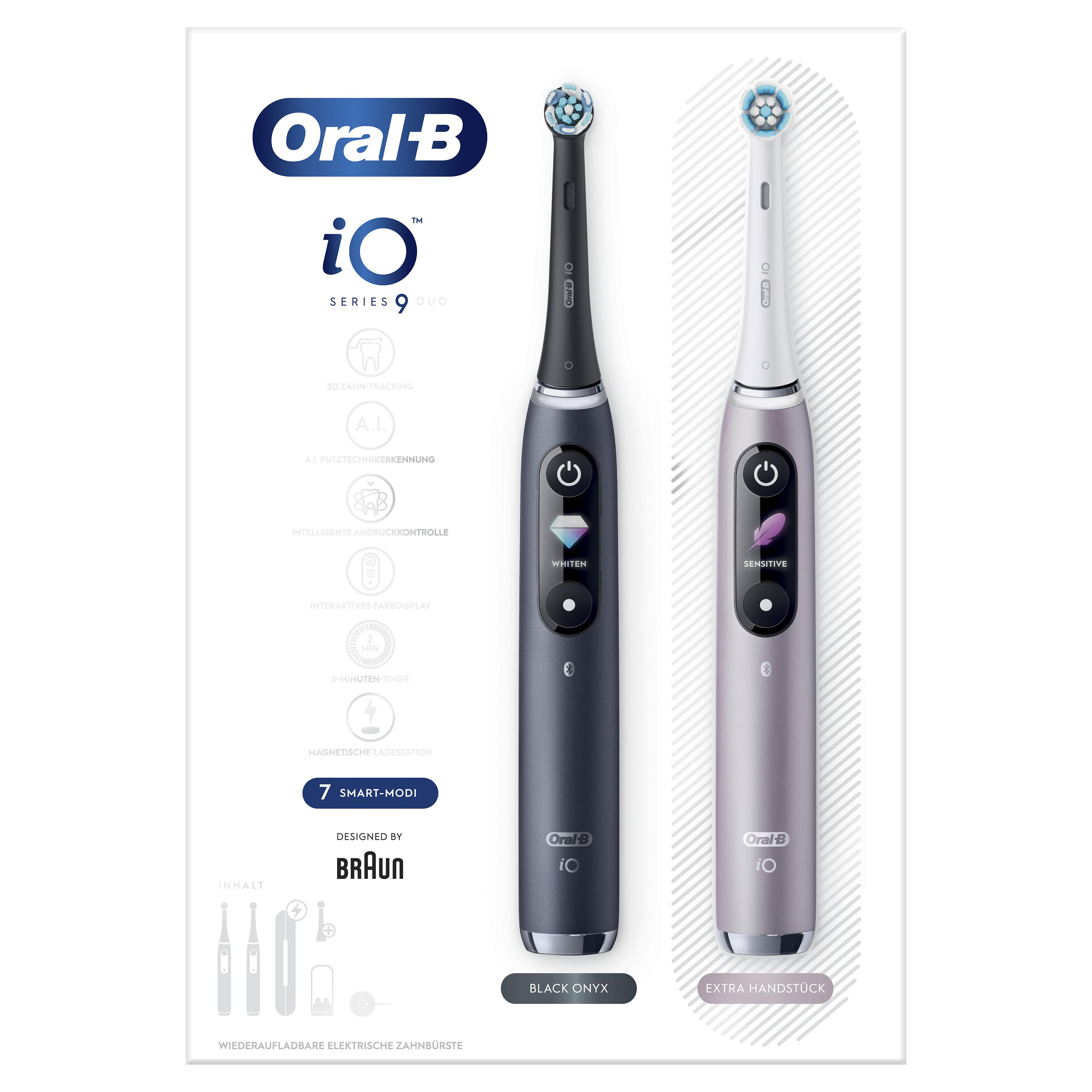 Zwei elektrische Zahnbürsten mit einer Box. Eine ist schwarz, die andere lila. Text: Oral B iO Serie.