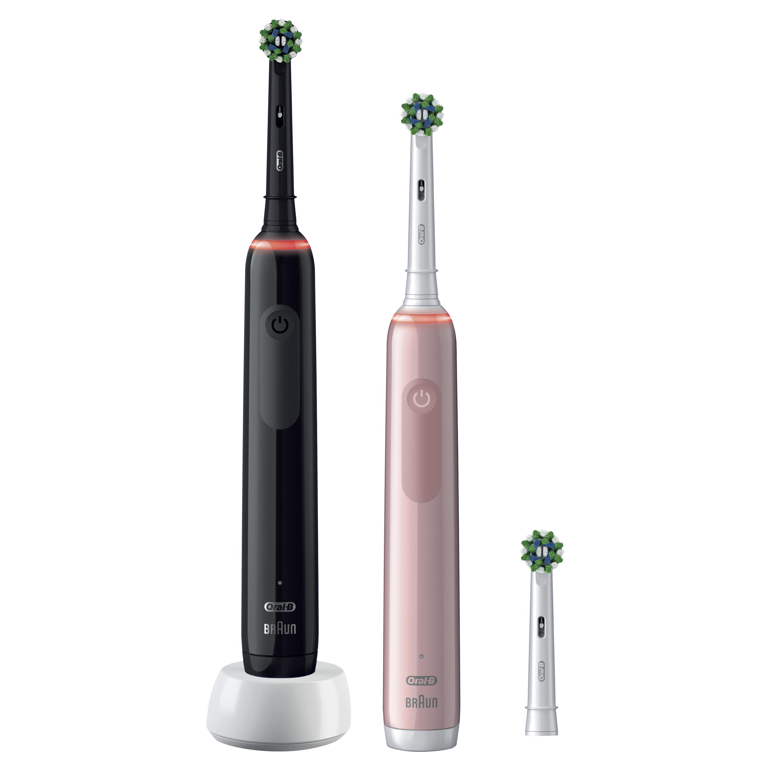 Zwei schwarze und rosa elektrische Zahnbürsten von Oral-B mit weißer Ladestation und zusätzlichem Bürstenkopf.