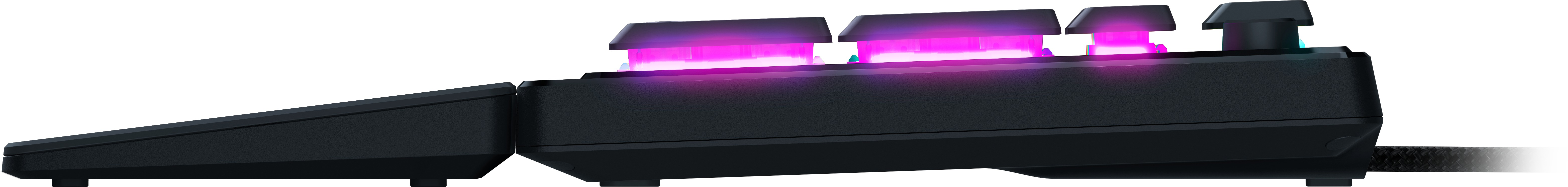 Vista laterale di una tastiera meccanica nera, tasti illuminati con luci rosa e viola.