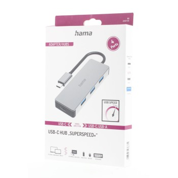 Concentrador USB-C en una caja, fondo blanco. Tiene puertos para múltiples conexiones.