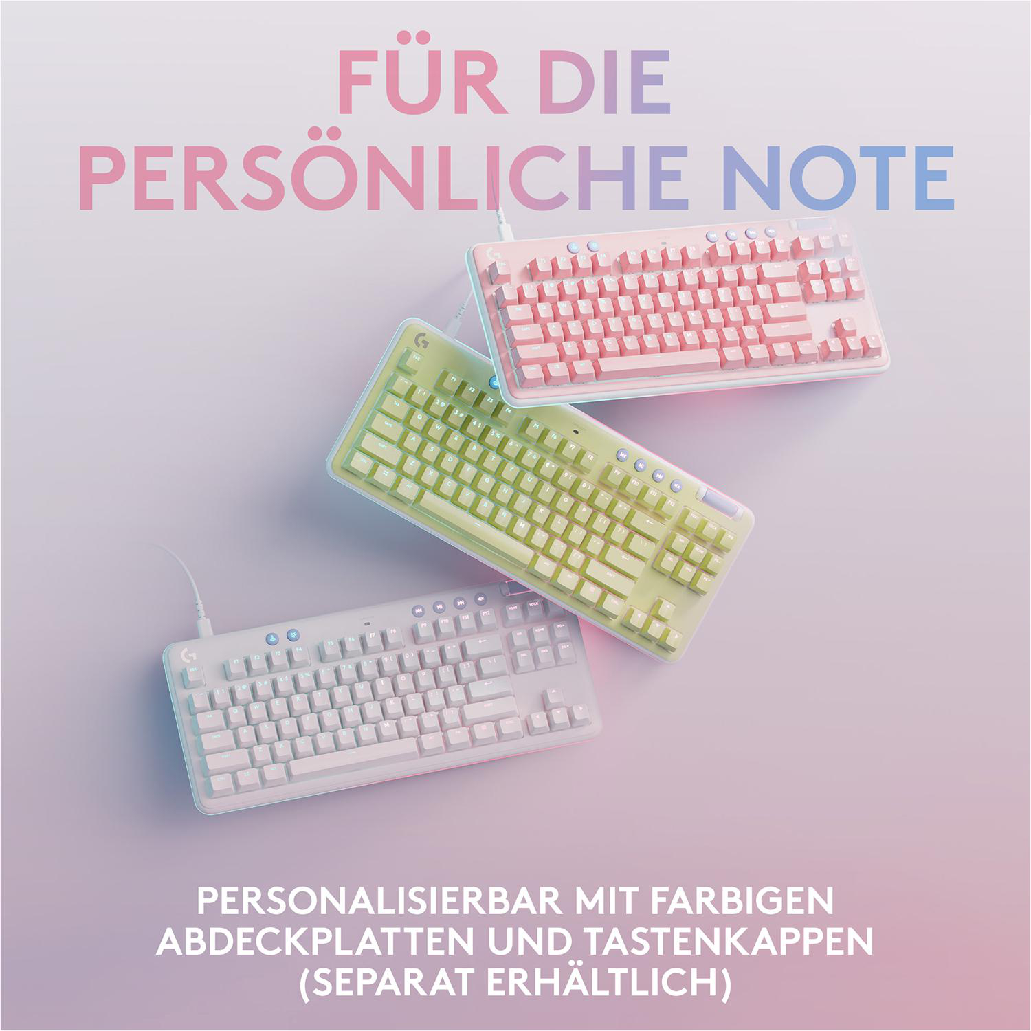 Drei bunte Tastaturen, rosa, grün und weiß, mit Tastenkappen und Kabeln.