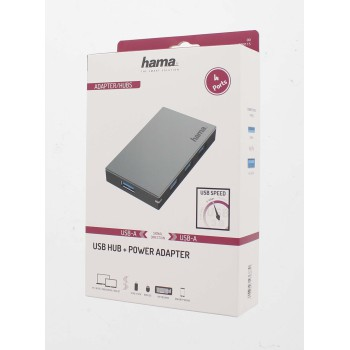 Una caja blanca para un concentrador USB y un adaptador de corriente, con un concentrador USB plateado que se muestra en el interior.