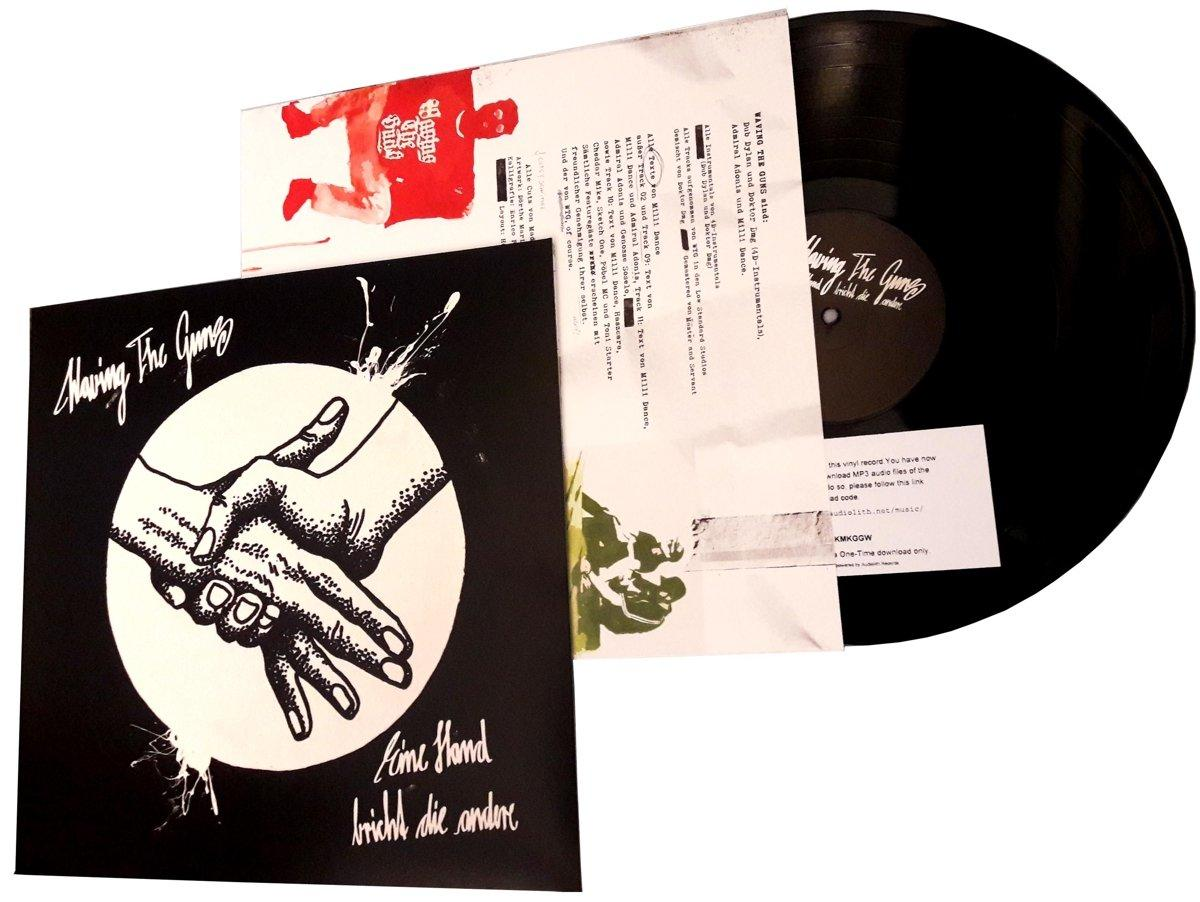 Vinyl-Schallplatte mit Cover-Art, eine Schwarz-Weiß-Zeichnung von zwei Händen.