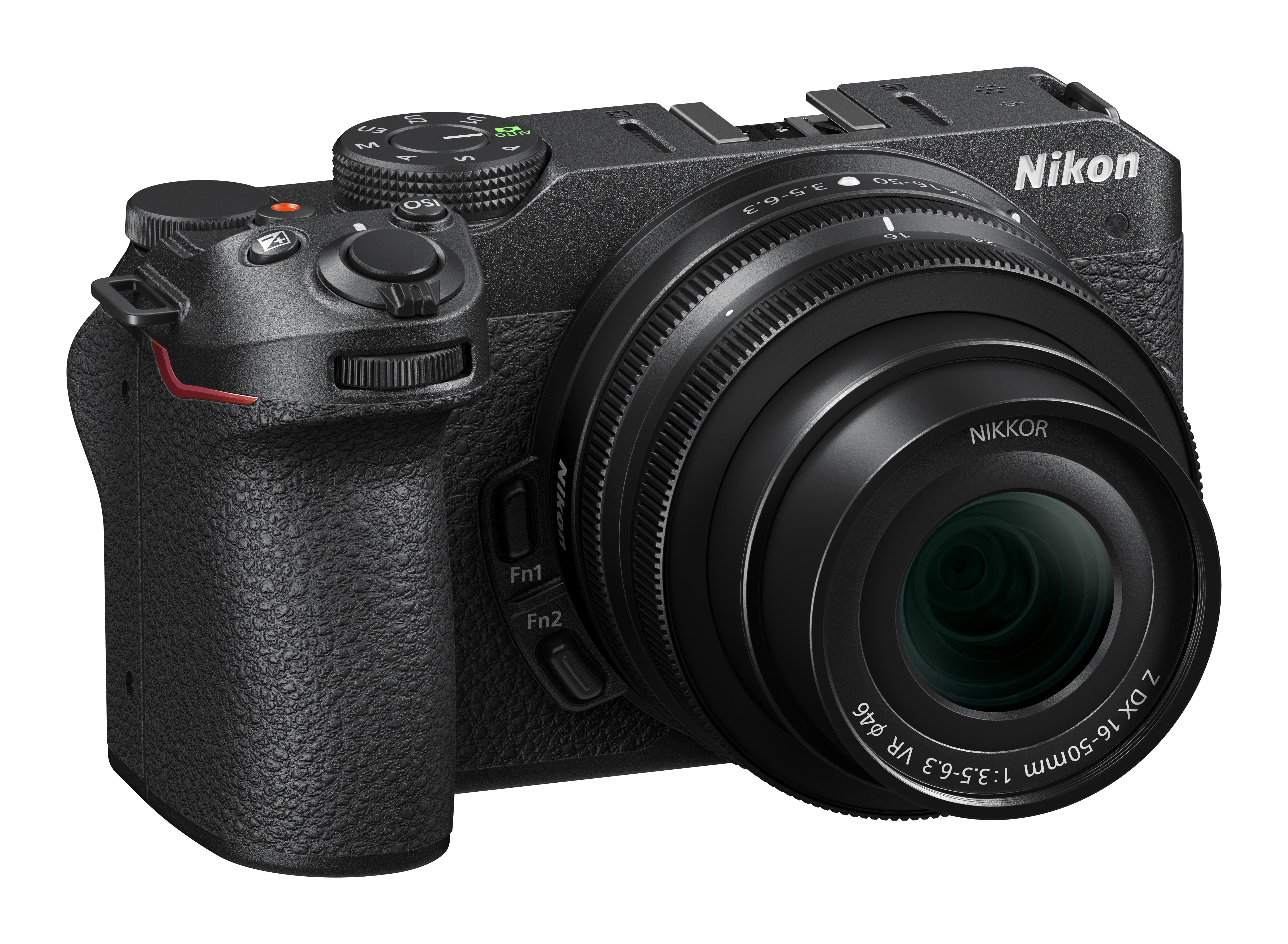 Schwarze Nikon Kamera mit Objektiv und weißem Hintergrund.