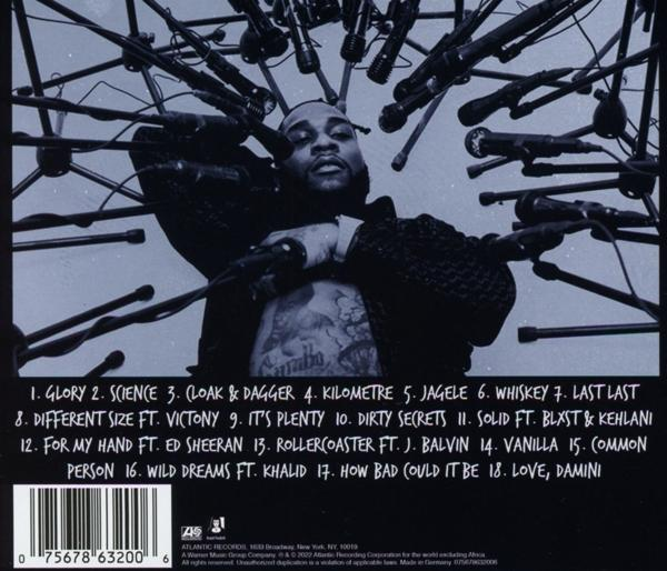 Albumcover mit einem von Mikrofonen umgebenen Mann. Albumtitel und Titelliste sind sichtbar.