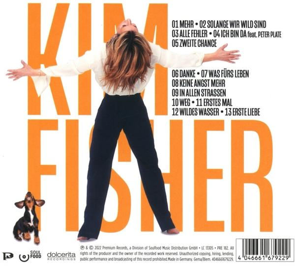 Albumcover mit einer Frau, die Arme ausgestreckt hat, vor einem orangefarbenen Hintergrund. Text ist vorhanden.