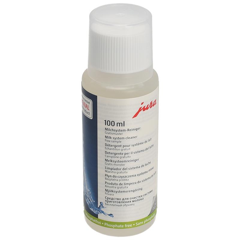 Flasche Jura Milchsystem-Reiniger. Weiße Flasche mit mehreren Sprachen auf dem Etikett.