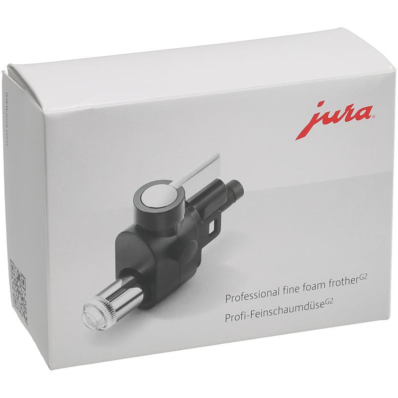 Eine weiße Box mit einem schwarzen und silbernen Kaffeemaschinen-Milchaufschäumer.