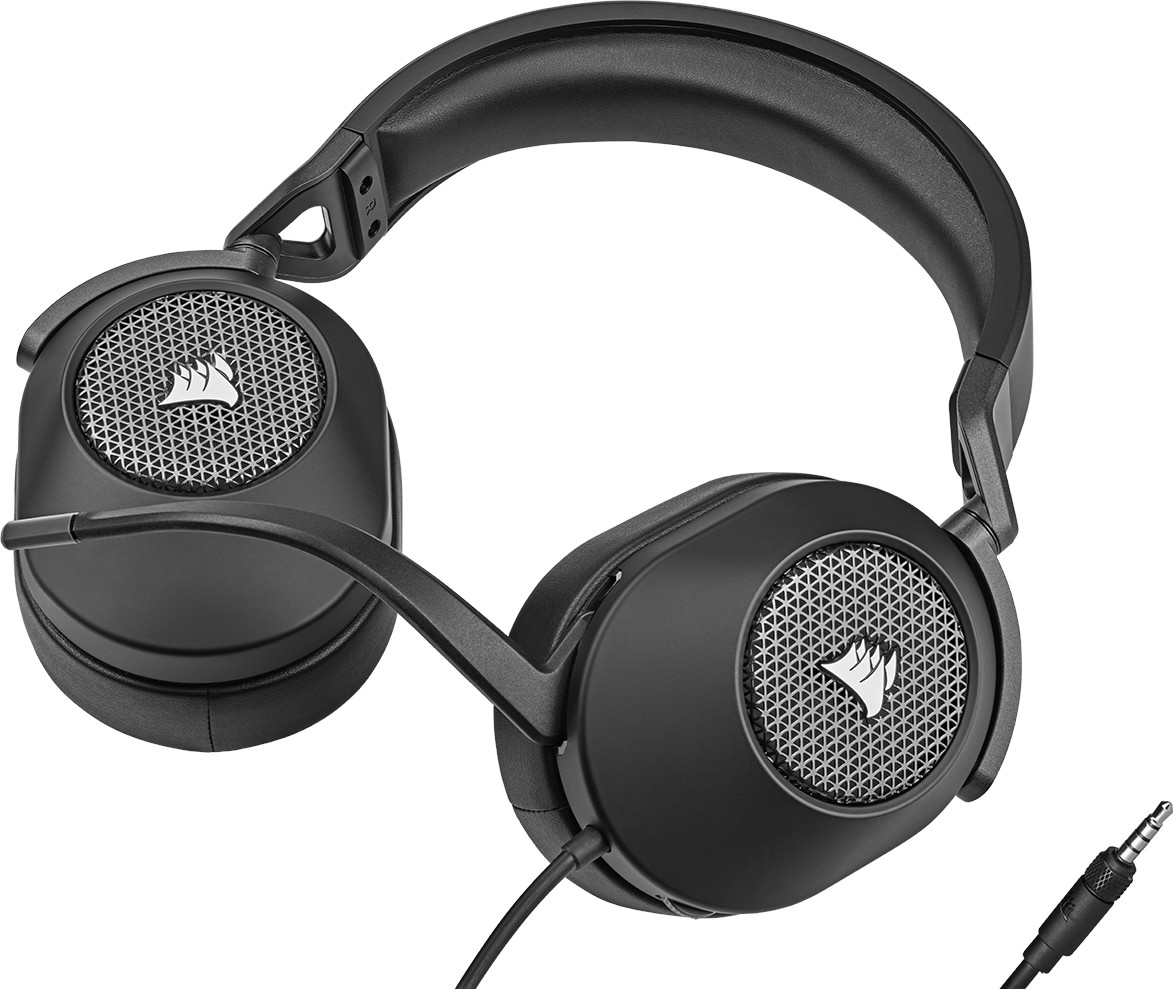 Casque noir avec microphone, sur une surface blanche.