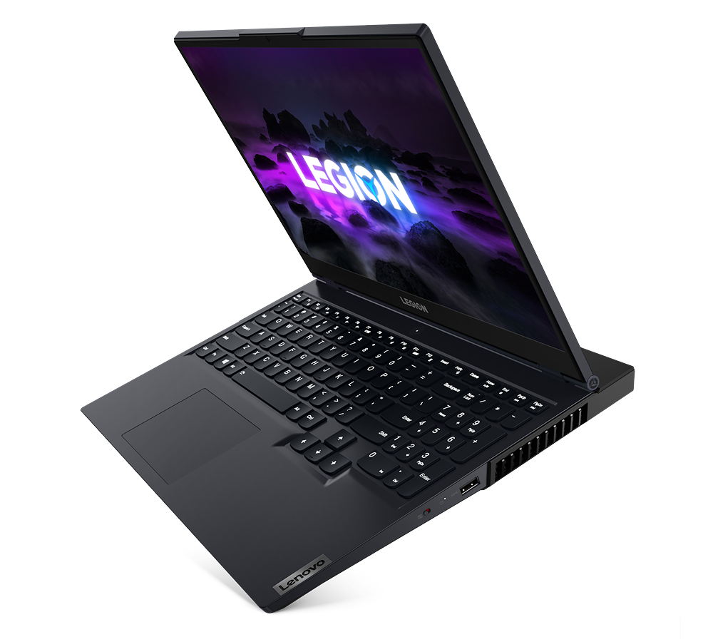 Portátil abierto con marco negro, mostrando una pantalla colorida. Teclado y logo de Lenovo visibles.