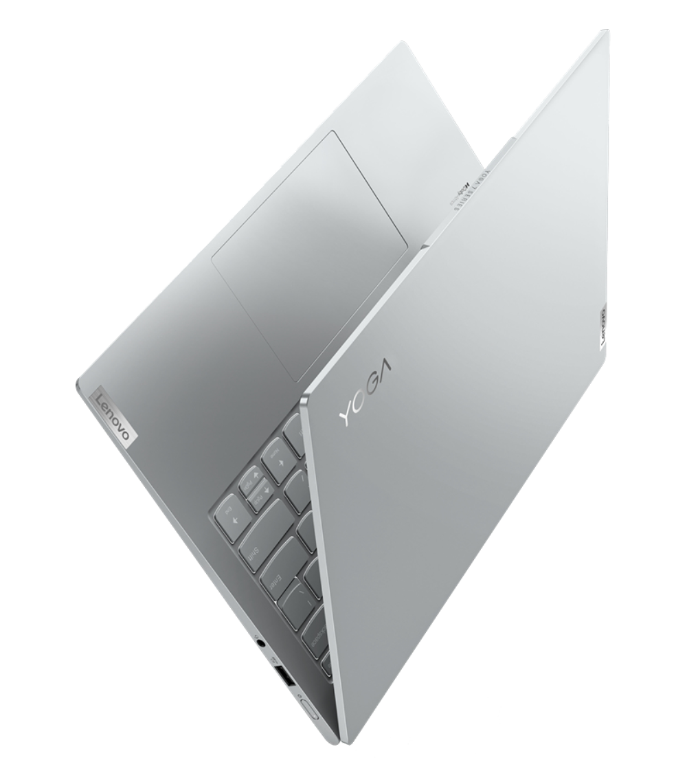 Laptop Lenovo Yoga plateado, parcialmente abierto, vista en ángulo. Fondo blanco.