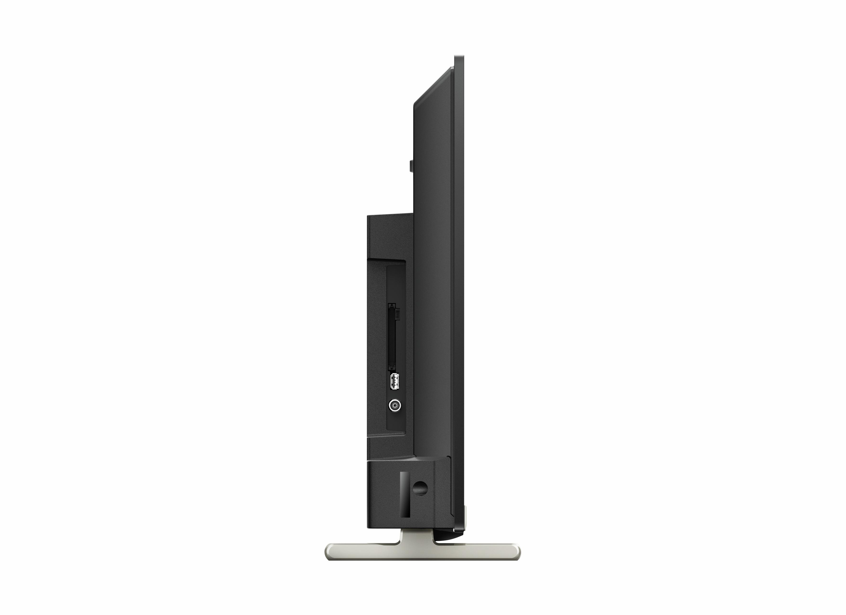 Fernseher von der Seite, weißer Hintergrund, mit sichtbaren Anschlüssen.