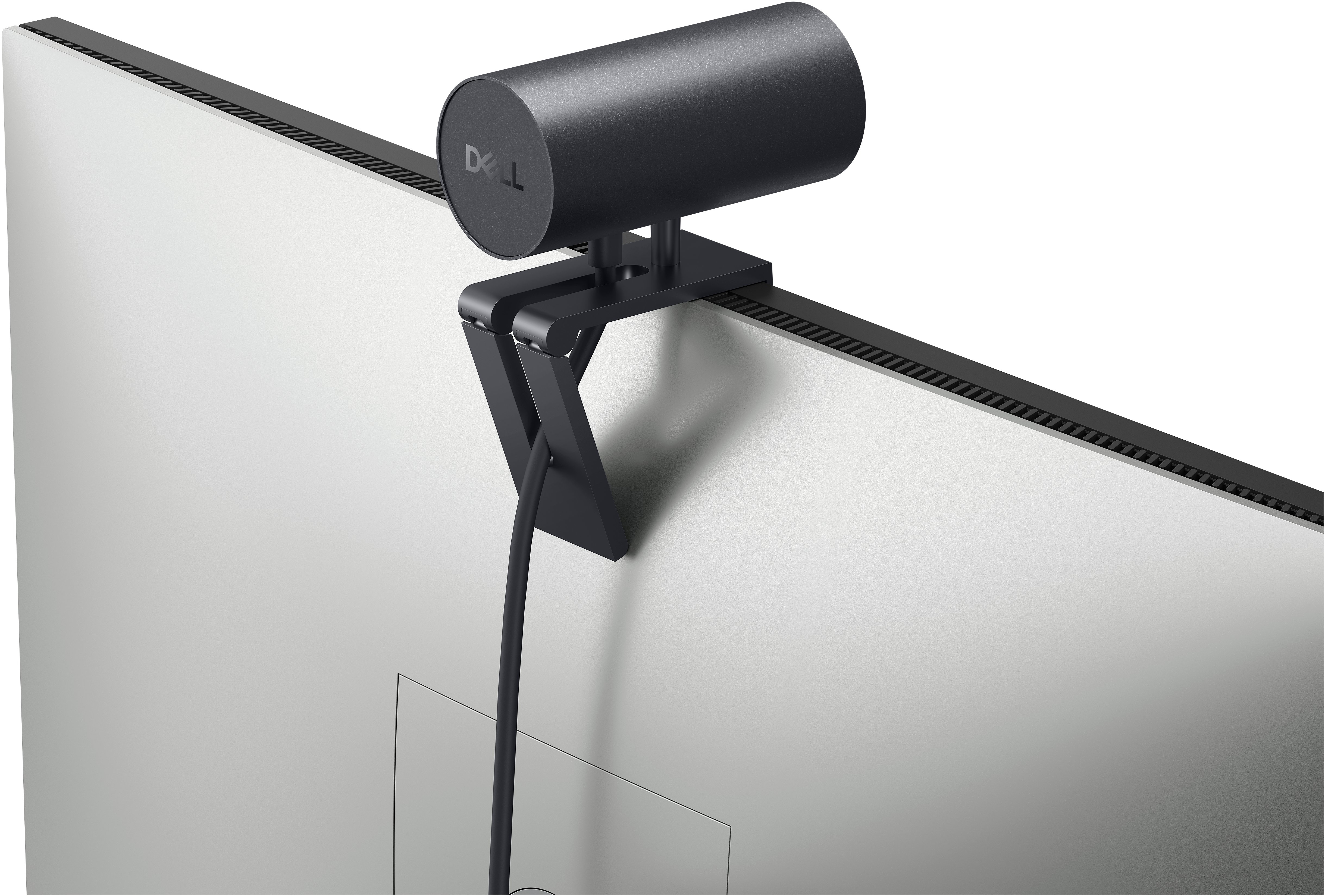 Eine schwarze Dell-Webcam ist an einem Monitor befestigt. Der Monitor ist silberfarben mit schwarzem Oberrand.