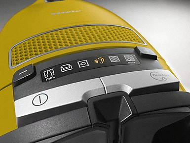 Gros plan sur le panneau de commande d'un aspirateur jaune avec diverses icônes de fonction.