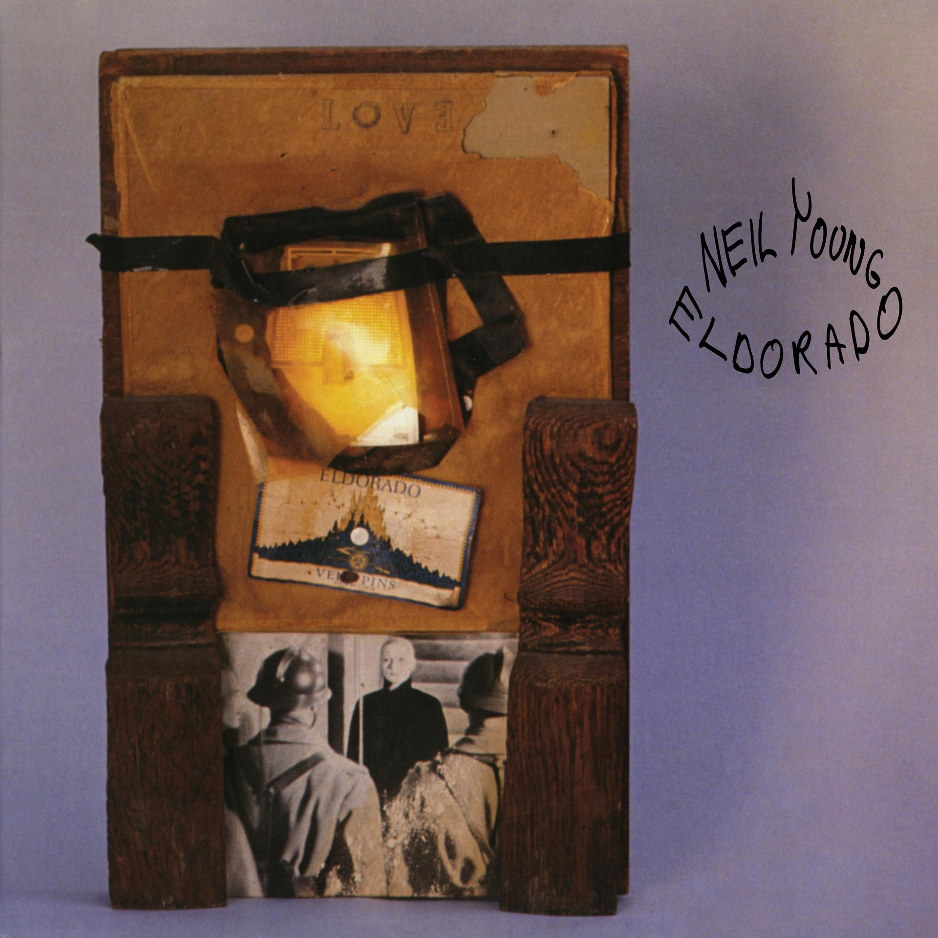 Neil Young Eldorado album borítója, régi könyvvel és fotókkal.