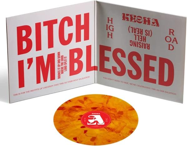 Disque vinyle avec motif coloré, album ouvert avec texte.